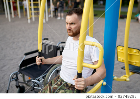 Disabled veteran, sport training in the park Disabled veteran, sport training in the park 82749285