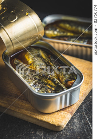 Canned sardines. Sea fish in tin can. 82750774