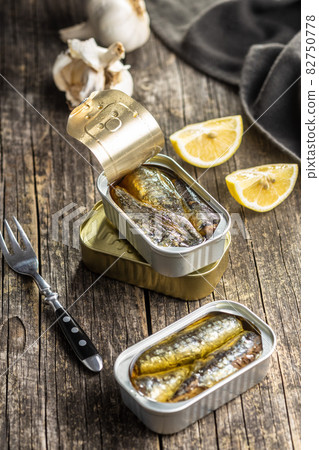 Canned sardines. Sea fish in tin can. Canned sardines. Sea fish in tin can. 82750778