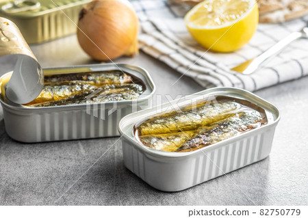 Canned sardines. Sea fish in tin can. 82750779