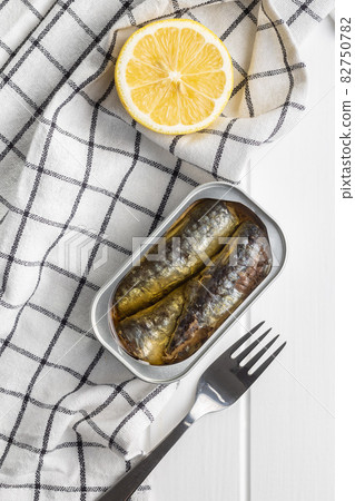 Canned sardines. Sea fish in tin can. 82750782