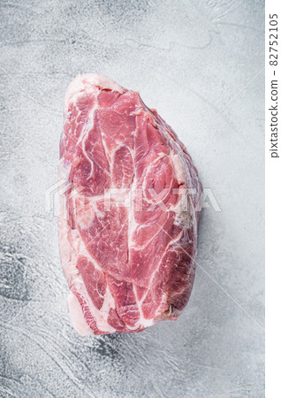 Raw pork neck meat for Chop steak on kichen table. White background. Top view Raw pork neck meat for Chop steak on kichen table. White background. Top view 82752105