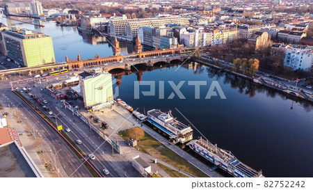 Beautiful Oberbaum Bridge over River Spree in Berlin from above - aerial view Beautiful Oberbaum Bridge over River Spree in Berlin from above - aerial view 82752242