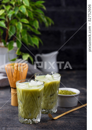 Cold matcha tea with milk and ice Cold matcha tea with milk and ice 82752606