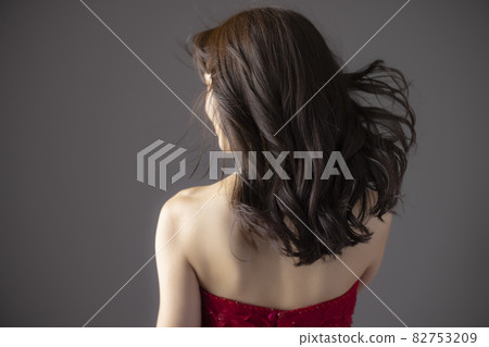 Woman in a red dress 82753209