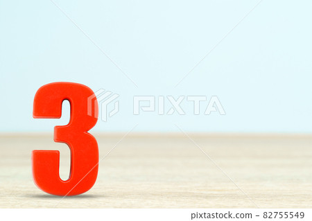 Shot of a number three made of red plastic 82755549