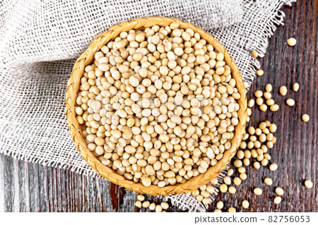 Soybeans in wicker bowl on dark board top Soybeans in wicker bowl on dark board top 82756053