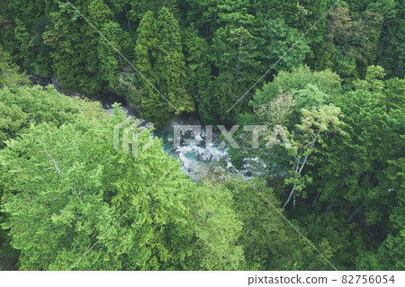 Beautiful valley in Japan "Atera Valley" where the river where the pure water that springs from the mountain flows and the beautiful forest of cypress spread Beautiful valley in Japan "Atera Valley" where the river where the pure water that springs from the mountain flows and the beautiful forest of cypress spread 82756054