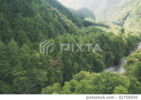 Beautiful valley in Japan "Atera Valley" where the river where the pure water that springs from the mountain flows and the beautiful forest of cypress spread Beautiful valley in Japan "Atera Valley" where the river where the pure water that springs from the mountain flows and the beautiful forest of cypress spread 82756056