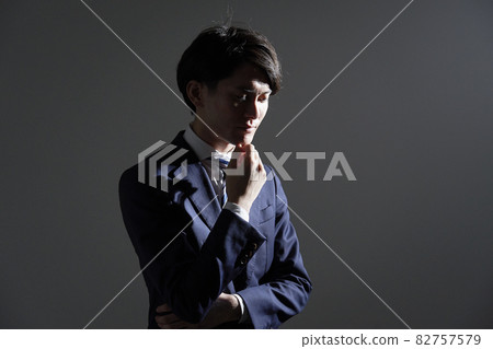 Thinking businessman silhouette Thinking businessman silhouette 82757579