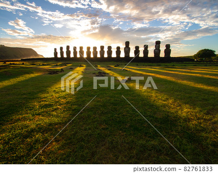 Sunrise over Moai stone sculptures at Ahu Tongariki, Easter island, Chile. Sunrise over Moai stone sculptures at Ahu Tongariki, Easter island, Chile. 82761833