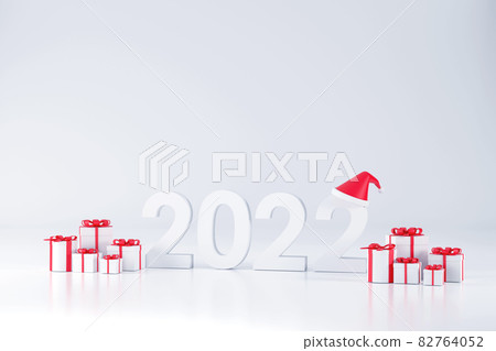 2022 font, Santa Claus hat and gift box At Christmas and New Year on a white background 2022 font, Santa Claus hat and gift box At Christmas and New Year on a white background 82764052