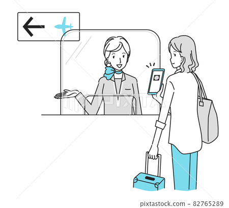 A woman showing a QR code on her smartphone at the airport 82765289