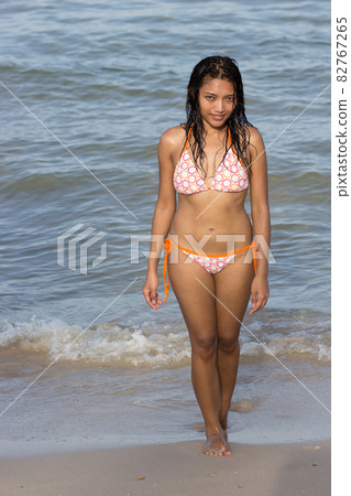 Young woman in bikini Young woman in bikini 82767265