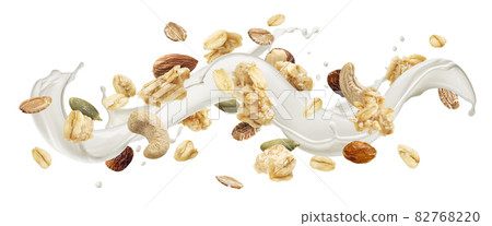 Granola with milk splash isolated on white background Granola with milk splash isolated on white background 82768220