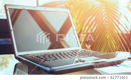 Closeup photo of a laptop computer with an open top, workplace b Closeup photo of a laptop computer with an open top, workplace b 82771921