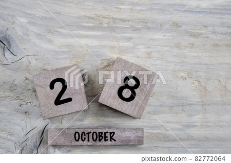 cube calendar for october on wooden background with copy space cube calendar for october on wooden background with copy space 82772064