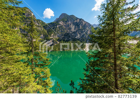Pragser Wildsee or Lago di Braies and Mountain range of Sasso del Signore - Trentino Italy 82773139