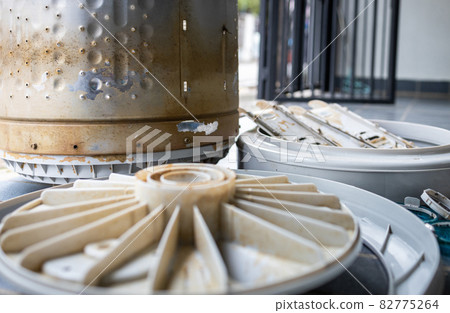 Dirt laundry tub full of mold,algae stains,preparing to clean and clear the washer drum,eliminate musty odors,stale smell,rust stains inside of machine for washing clothes at home,big cleaning concept 82775264