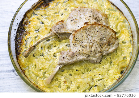 seared pork chop roasted on creamy onion seared pork chop roasted on creamy onion 82776036
