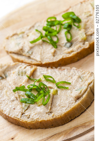 cracklings spread on bread with spring onion cracklings spread on bread with spring onion 82776385