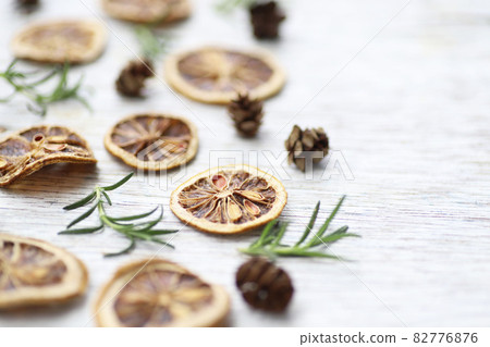 Dried lemon slice, rosemary and cedar sequoia fruit background image Dried lemon slice, rosemary and cedar sequoia fruit background image 82776876