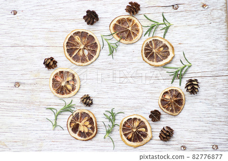 Dried lemon slice, rosemary and cedar sequoia fruit background image Dried lemon slice, rosemary and cedar sequoia fruit background image 82776877