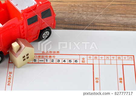 Image photo of fire insurance with fire engine and payment table Image photo of fire insurance with fire engine and payment table 82777717