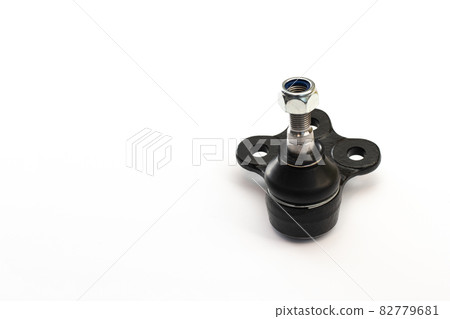 New spherical joint. Spare parts, the spherical joint of the ball joint. Vehicle's front suspension. Isolated on a white background. Selective focus. New spherical joint. Spare parts, the spherical joint of the ball joint. Vehicle's front suspension. Isolated on a white background. Selective focus. 82779681
