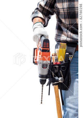Carpenter holding rechargeable hammer drill, isolated on white background. 82780198