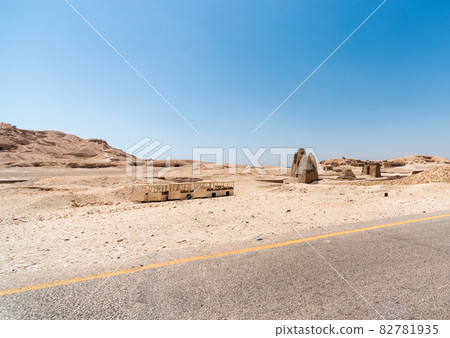 old buses without wheels in the desert in Egypt 82781935
