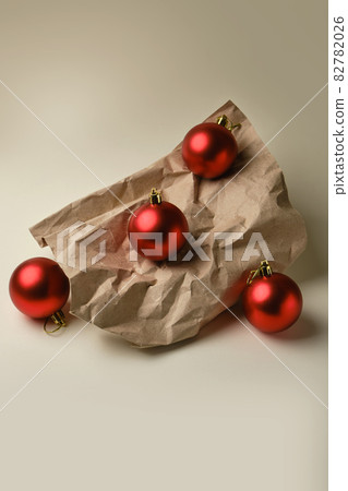 Composition of Red Christmas balls on beige background 82782026
