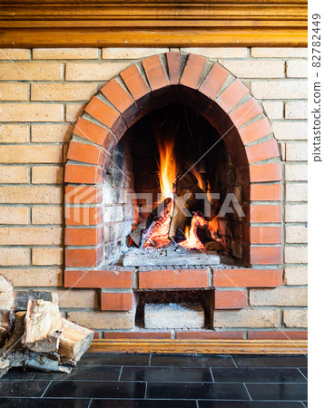 front view of brick fireplace with mantelpiece front view of brick fireplace with mantelpiece 82782449
