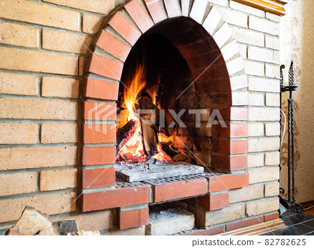 brick fireplace with mantelpiece in country house 82782625