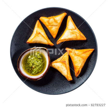 Peruvian Empanadas fried Turnovers on plate cutout 82783227