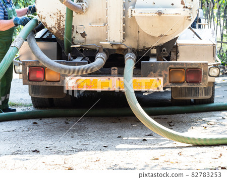 pumping out waste water with cesspool machine 82783253