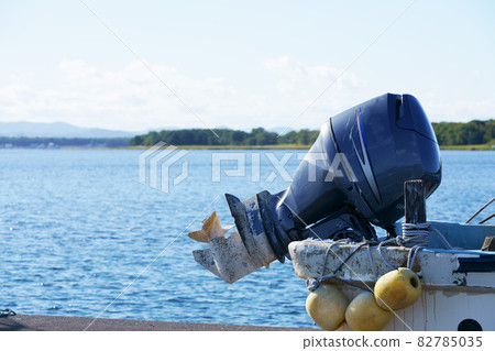 Fishing boat outboard motor screw water surface 82785035