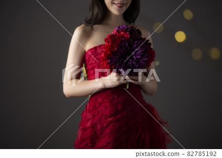 Woman in a red dress 82785192