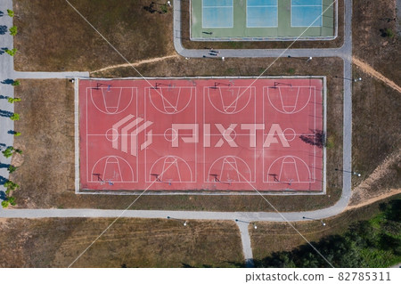 Empty basketball courts. View from the drone perpendicularly down Empty basketball courts. View from the drone perpendicularly down 82785311