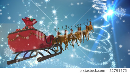Composition of santa claus in sleigh pulled by reindeer with snow falling on blue background Composition of santa claus in sleigh pulled by reindeer with snow falling on blue background 82791573