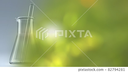 Composition of stirrer in empty chemistry flask, with blurred green and yellow copy space to right Composition of stirrer in empty chemistry flask, with blurred green and yellow copy space to right 82794281
