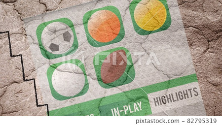 Composition of sports balls on green signs over cracked soil surface 82795319