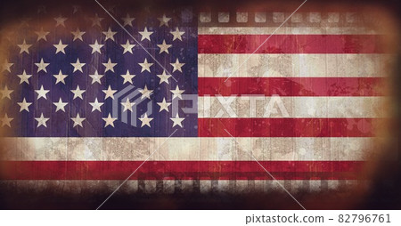Composition of american stars and stripes flag on distressed vintage film with sprockets 82796761