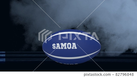 Blue rugby ball with samoa text against smoke effect on black background Blue rugby ball with samoa text against smoke effect on black background 82796848
