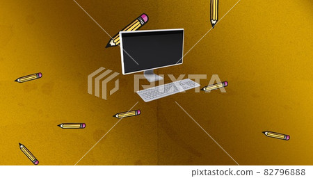 Composition of desktop computer and yellow pencils floating on gold background 82796888