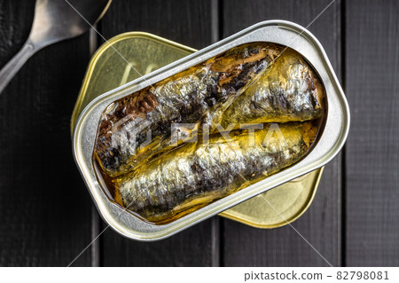 Canned sardines. Sea fish in tin can. 82798081