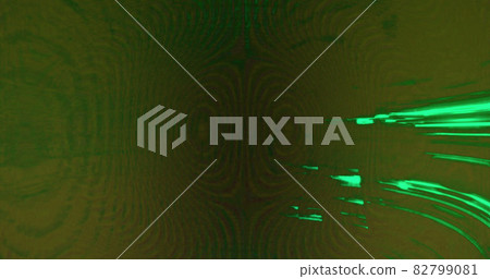 Digital image of green light trails flickering against black background 82799081