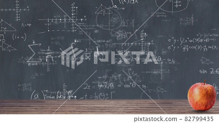Composition of mathematical equations over black chalkboard 82799435