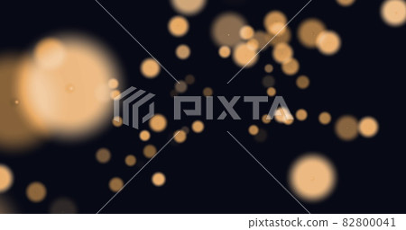 Image of glowing orange spots of light moving in hypnotic motion on black background Image of glowing orange spots of light moving in hypnotic motion on black background 82800041