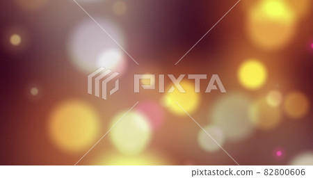 Image of multi coloured glowing spots of light moving in hypnotic motion on background Image of multi coloured glowing spots of light moving in hypnotic motion on background 82800606